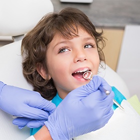 Child receiving dental exam