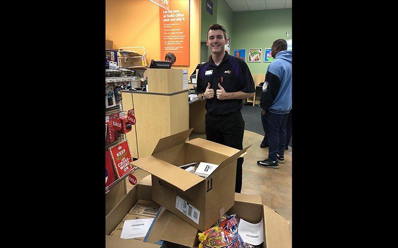 Team member collecting candy for the buy back