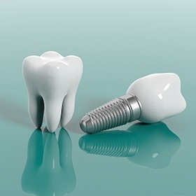 dental implant with crown next to a natural tooth