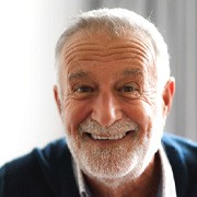 Close-up of bearded senior man smiling