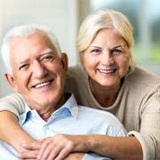 Older couple smiling together