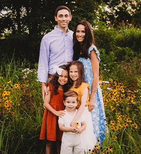 Dr. Julia and Dr. Brandon White and their family