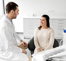 Patient and dentist discussing smile makeover treatment plan