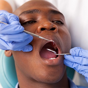 Man receiving dental exam