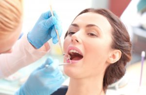 person getting their teeth cleaned